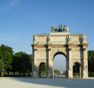 The Arc de Triomphe du Carrousel (firmly anchored to the tradition of the ancient triumphal arches) was built by Percier and Fontaine in circa 1806 to 1808 to celebrate the Napoleonic victories of 1805, and it was originally intended as a monumental entrance to the Tuileries palace. When that palace was destroyed by fire in 1871, it was generally agreed that the arch stood well on its own; nor was the palace greatly missed in that an exceptional view of the Champs-Elysées had been opened up.