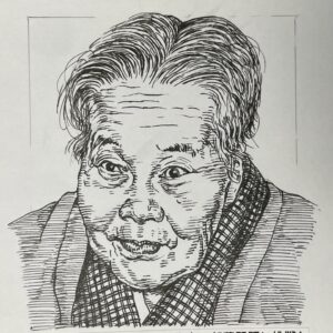 1902-1997を生きた小説家であり児童文学家。少女期から雑誌投稿を始め、講談社婦人記者となり、結婚後、農民文学運動に参加ししていた夫を、自らの文筆でも支える。戦後は児童文学「みかん(1952)」で小学館児童文化賞、長編童話「夜あけ朝あけ(1954)」で毎日出版文化賞を受賞するなど、童話分野で実績を重ねる。代表作「橋のない川」は部落差別を真正面から描いた大河小説で、単行本として1961年から1992年まで全7部を発行し、累計800万部を超えるロングセラーとなった。牛久沼畔に拠点を構え、農耕と執筆を両立しながら、人間平等と生命尊重を訴え続けた。